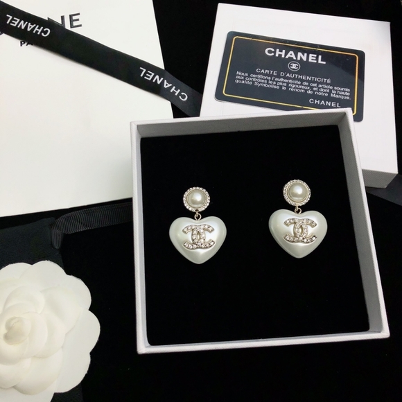 "Regal Rosettes: Rose Gold Statement Earrings by CHANEL" - Picture 4 of 8